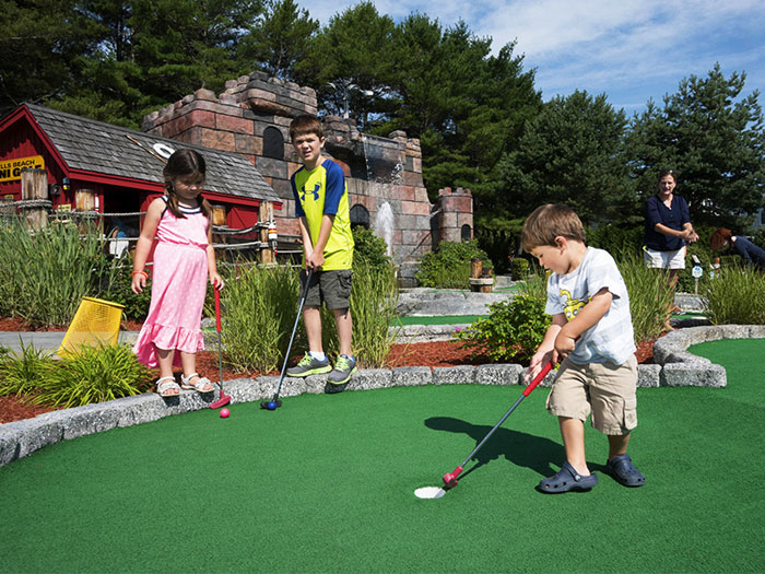 Kids at the Sun Outdoors Campground Mini-Golf Course