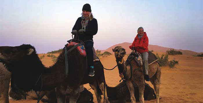 Women Travel Guides on Camels